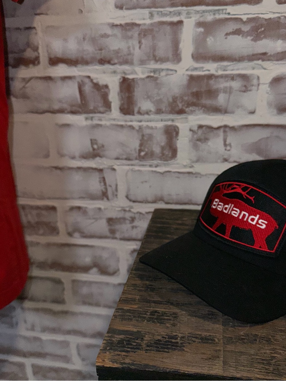 Badlands Black & Red Trucker Cap — Embroidered Logo